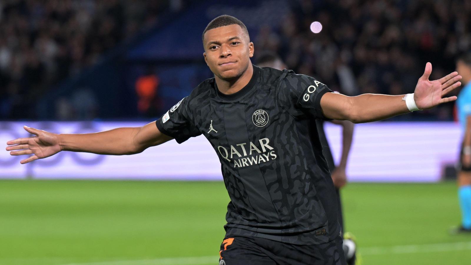 Kylian Mbappe of Paris Saint-Germain celebrates his penalty goal during the UEFA Champions League match between Paris Saint Germain and Borussia Dortmund at Parc des Princes on September 19, 2023 in Paris, France.